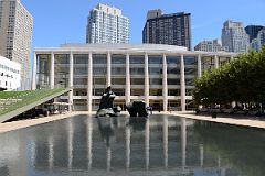 10-2 Reclining Figure By Henry Moore In Paul Milstein Pool With New York Philharmonic David Geffen Hall Behind At Lincoln Center New York City